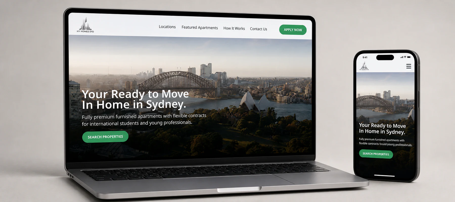 Sitio inmobiliario HY Homes Sydney presentado en una notebook y un celular